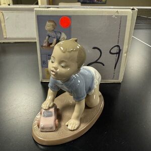 Lladro Porcelain Baby Boy Figurine with Toy Car